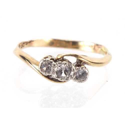2467 - Unmarked gold white sapphire crossover ring, size L, approximate weight 1.6g