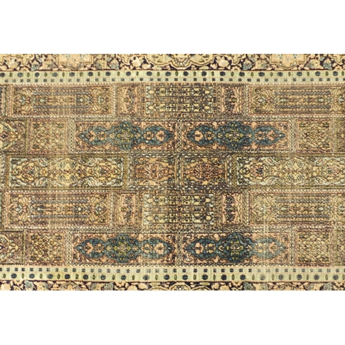 2051 - Rectangular Persian silk carpet runner having an all over panelled design, 300cm x 93cm