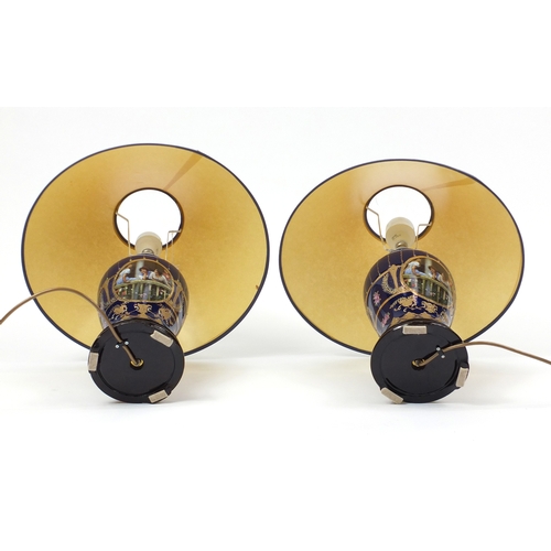 2012 - Pair of Italian porcelain table lamps with shades, hand gilded and transfer printed with females on ... 