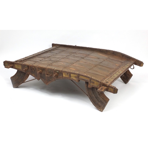2056 - Indonesian hardwood Howdah table with metal mounts, 42cm H x 150cm W x 140cm D