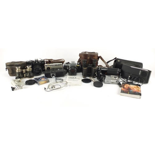 212 - Vintage and later cameras, lenses and binoculars including Pentax, Kodak and Zenit