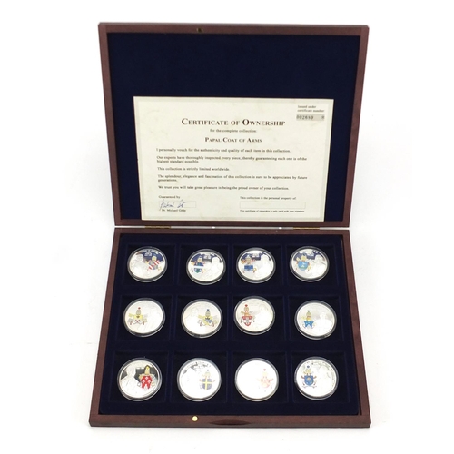 447 - Papal Coat of Arms limited edition set of twelve enamel coins, with certificate