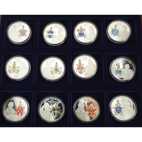 447 - Papal Coat of Arms limited edition set of twelve enamel coins, with certificate