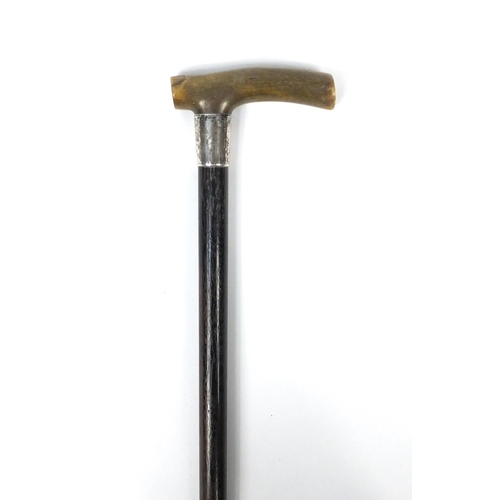 285 - Ebonised walking stick with horn handle and silver collar, Birmingham hallmarked, 85cm in length