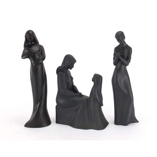 79 - Three Royal Doulton figurines including mother and daughter, the largest 30.5cm high