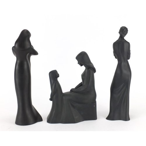 79 - Three Royal Doulton figurines including mother and daughter, the largest 30.5cm high