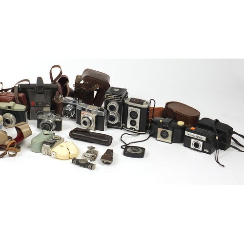 204 - Vintage and later cameras, lenses and accessories including Photina Reflex, Raja number 6, Kodak and... 