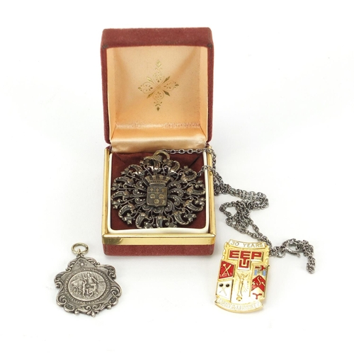 397 - Silver coloured metal pendant on chain, a jewel and an enamelled light and liberty badge