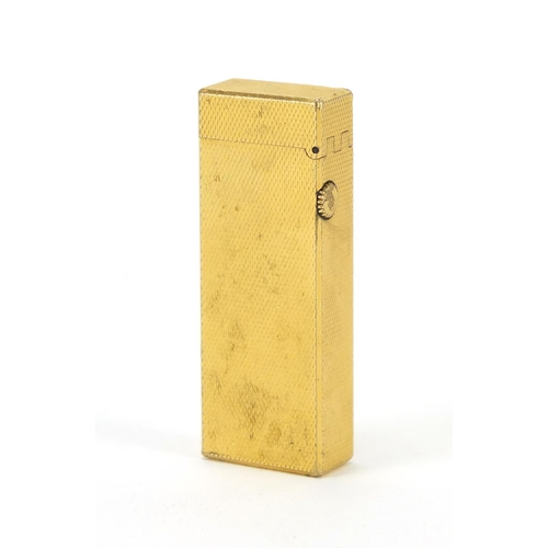 386 - Dunhill gold plated pocket lighter, with engine turned decoration, 6.5cm in length