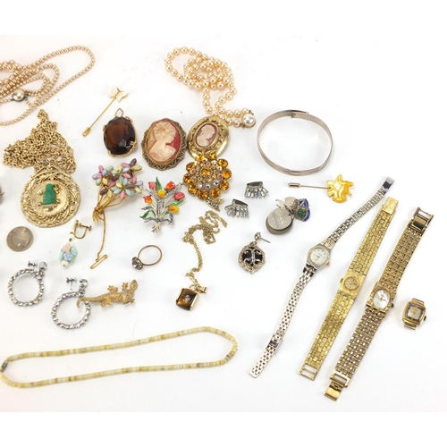 262 - Costume jewellery including cameo brooches, simulated pearls, wristwatches and a Selfridge necklace ... 