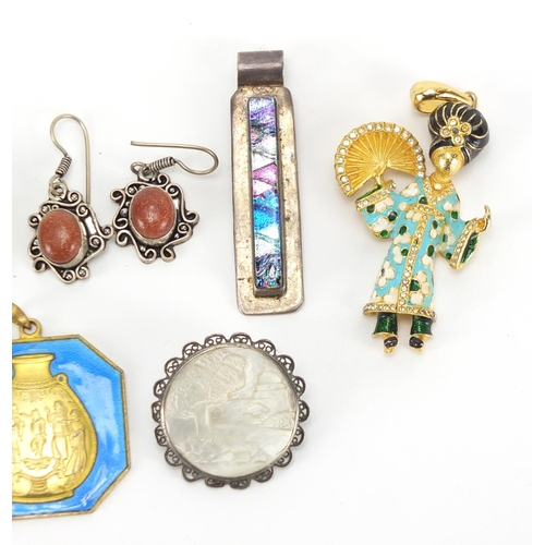 242 - Costume jewellery including sandstone earrings and brooch, enamelled Geisha girl pendant and Chinese... 