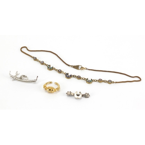 241 - Jewellery including a gilt metal micro mosaic necklace, Victorian silver horseshoe brooch and a scar... 