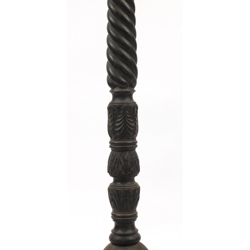 34 - Stained hardwood spiral column and carved torchiere, 142cm high