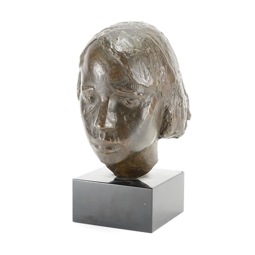 2186 - Patinated bronze bust of a young female, raised on a square black slate base, overall 35cm high