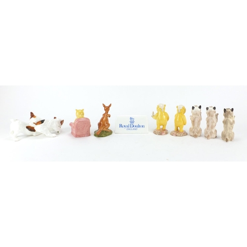 2124 - Nine Royal Doulton characters and animals and a Royal Doulton plaque, including Kanga and Roo from T... 