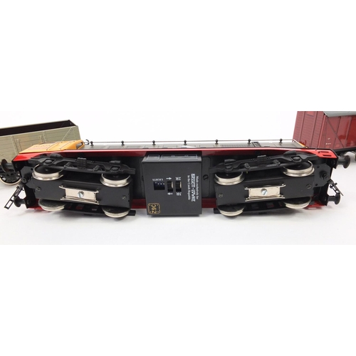 2157 - Bassett-Lowke O gauge tin plate with boxes, comprising class twenty diesel locomotive and set of thr... 