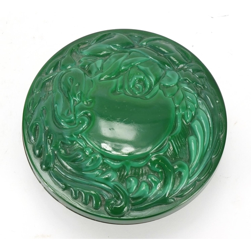 418 - Malachite glass box and cover, the lid moulded with leaves, 10.5cm in diameter