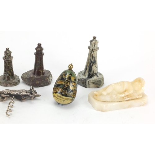 411 - Objects including marble lighthouses, alabaster carving of a nude child and silver plated fox corksc... 