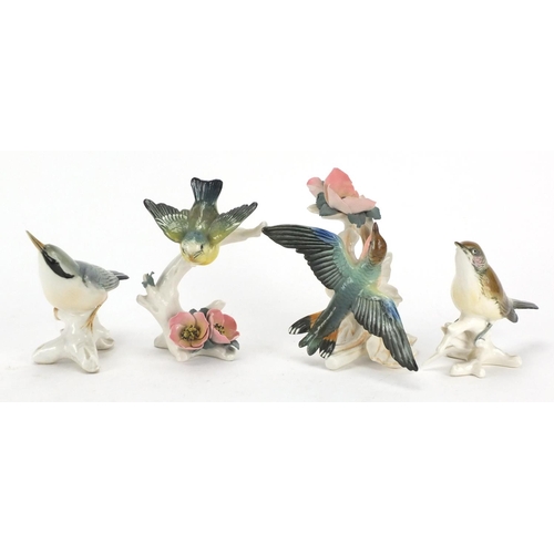 142 - Four Karl Ens china bird groups, the largest 14cm high