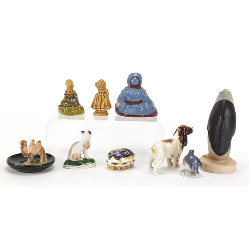 422 - China figures and animals including a Wade fish waiter, Beswick spaniel and Royal Crown Derby Millen... 