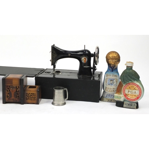 190 - Vintage items including lantern, ceramic barrel, electric iron, cigarette dispenser and an enamelled... 