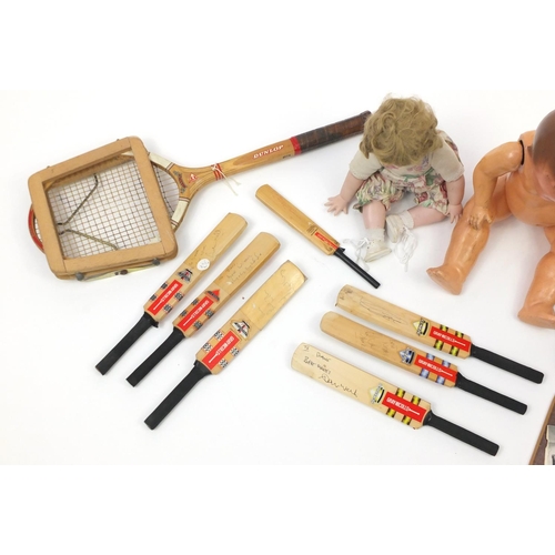 546 - Vintage and later toys including miniature signed cricket bats, large composite doll and a child's s... 