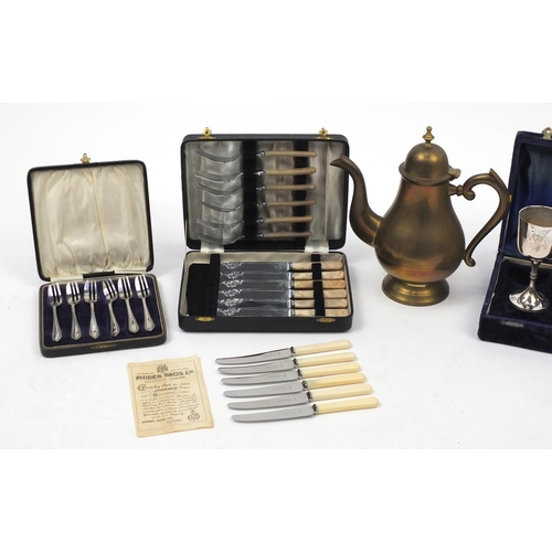207 - Metalwares including cased sets of silver plated cutlery and a brass coffee pot