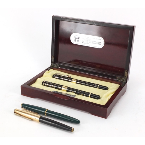 438 - Pair of Chinese fountain pen and ballpoint pen set and two Parker fountain pens, one with 14ct gold ... 