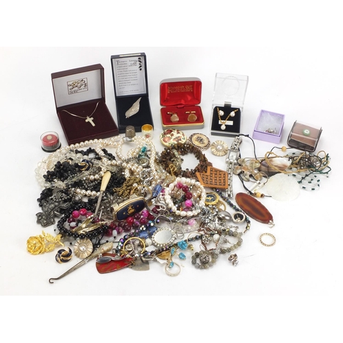 263 - Costume jewellery including silver rings, earrings, tiger's eye bracelet, simulated pearl necklaces ... 