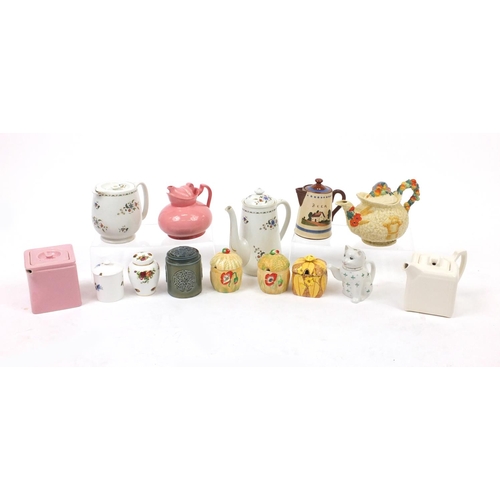 205 - China teapots and storage jars including Wade, Shelley, Crown Devon and Newport