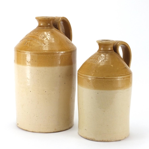 552 - Two stoneware advertising flagons for Rye and Battle, the largest 33cm high