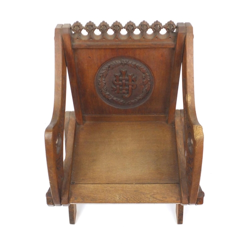 2009 - 19th century Gothic style carved oak Glastonbury chair, 84cm high