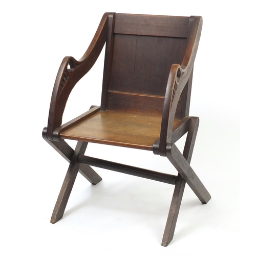 2017 - 19th century Gothic style carved oak Glastonbury chair, 92cm high