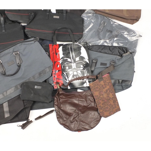 557 - As new bags and holdalls including Aramis and Davidoff