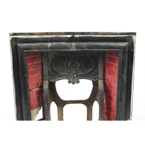 32 - Edwardian cast iron fire surround with tiled back and cast iron basket, 97cm high