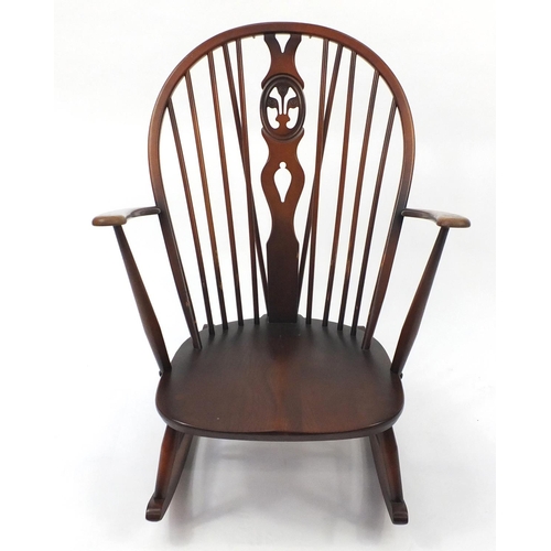 31 - Ercol elm stick back rocking chair, 94cm high