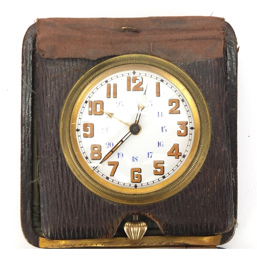 255 - Vintage leather cased travel alarm clock, with enamelled dial