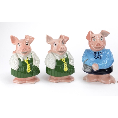 2173 - Six Wade Natwest piggy banks, the largest 19cm high