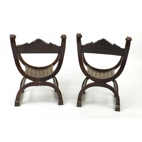 2005 - Pair of late 19th century renaissance style walnut throne chairs, carved with heads and foliage, eac... 