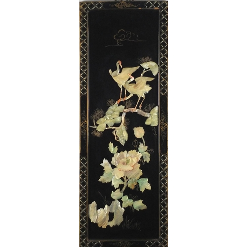 2094 - Three Oriental black lacquered panels with relief Mother of Pearl, decorated with birds of paradise ... 