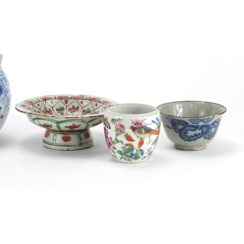 81 - Oriental pottery including blue and white porcelain teapot, tea bowls and a footed dish