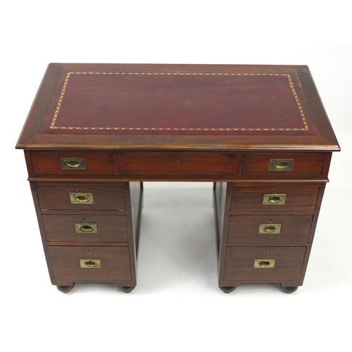 2001 - Late 19th century mahogany campaign style twin pedestal desk, with tooled red leather insert, 76cm H... 
