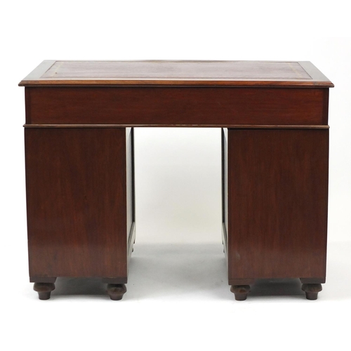 2001 - Late 19th century mahogany campaign style twin pedestal desk, with tooled red leather insert, 76cm H... 