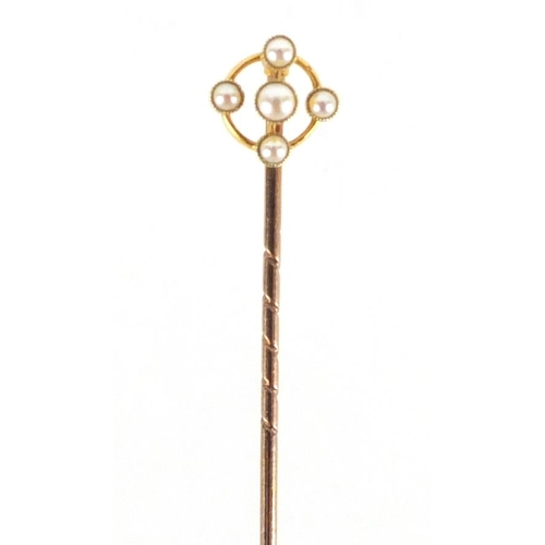 2343 - Victorian 15ct gold seed pearl tie pin, housed in a Victorian tooled leather box, 5.5cm in length, a... 
