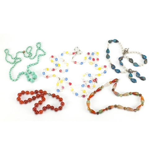 2364 - Five bead necklaces including carnelian and turquoise