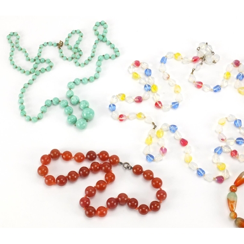 2364 - Five bead necklaces including carnelian and turquoise
