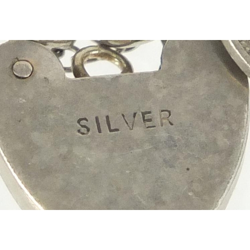 2279 - Two silver charms bracelets with selection of mostly silver charms including miners lamp, shire hors... 