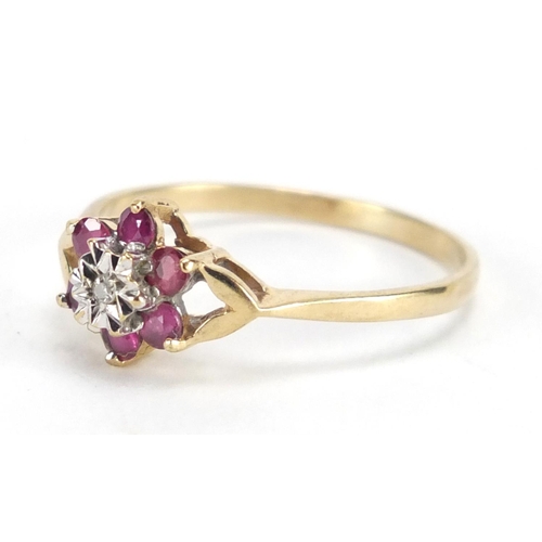 2333 - 9ct gold diamond and pink stone flower head ring, size O, approximate weight 1.4g