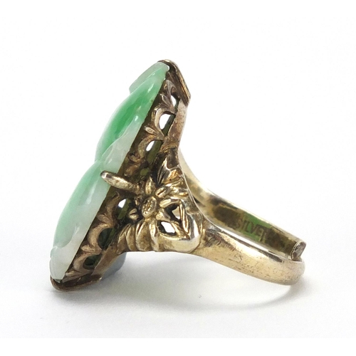 223 - Chinese silver and green jade ring carved with fruit amongst leaves, size O, approximate weight 7.6g