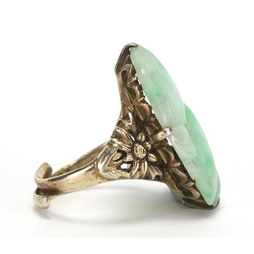 223 - Chinese silver and green jade ring carved with fruit amongst leaves, size O, approximate weight 7.6g